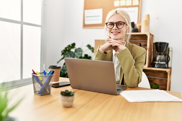 Canvas Print - Young blonde woman business worker using laptop working at office