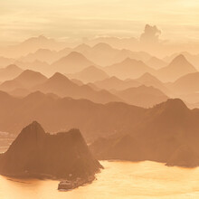 View Of Mountain Landscape At Sunset Across The Guanabara Bay In Rio De Janeiro, Brazil.