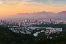 Aerial Panorama View Of Tirana At Sunset, The Capital City In Albania.
