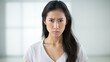 Portrait of Close-up of angry and upset pretty asian woman waiting for explanation, white background 