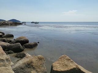 Seaside view with bright sky