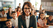 female teacher in glasses with students in classroom