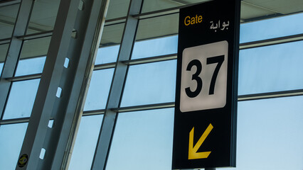 Wall Mural - Gate sign at a large modern airport