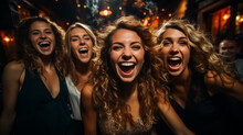 Close-up on four women faces in extreme euphoria inside a street crowd to celebrate a very happy event with night street lights in blurry background