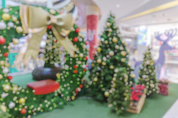 Wall Mural - Abstract blurred christmas tree with bokeh light background