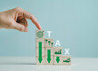 Wooden block with tax deduction icon to achieve environmental goals Using environmental taxes, carbon taxes, tax benefits that are Environmental tax abatement concept