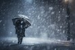 Person with umbrella walking in snowfall at night