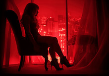 Woman In Red Dress In Red Room