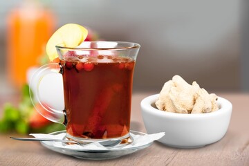 Poster - A cup of hot tasty ginger tea with root