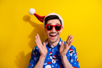 Wall Mural - Photo of impressed cheerful person raise opened arms palms open mouth isolated on yellow color background