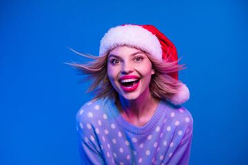 Wall Mural - Photo of cheerful excited lovely girl wear trendy pullover having fun nightclub isolated on blue color background