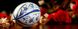 Sport. A modern rugby ball near some flowers.