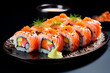 Japanese food Sushi Roll with salmon, avocado and caviar on black background
