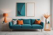 © Marko - Teal curved sofa with orange pillows against white wall with poster. Scandinavian style home interior design of modern living room