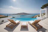 Fototapeta Niebo - Two deck chairs on terrace with pool with stunning sea view. Traditional mediterranean white architecture. Summer vacation concept