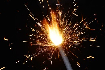 Canvas Print - Closeup of a Sparkler with a dark background