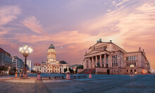 Panorama Image Of Gendarmenmarkt Square In Berlin With Cathedral And Concert Hall At Dawn.