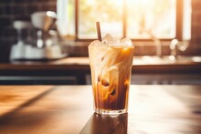 Sun-kissed Iced Coffee On Wooden Table