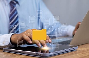 Fototapete - Efficient document management system for Business online file access and collaboration, businessman touch folder and document icon software, Cloud document management business processes and sharing