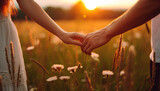 Fototapeta Przestrzenne - couple holding hands in the field, love