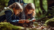 Children discovering treasure on a scavenger hunt in the woods