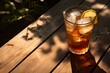 Bask in the warmth of the afternoon sun with a thirst-quenching glass of sweet tea on a rustic table