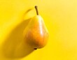 pear on a yellow