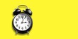 canvas print picture - Alarm clock on yellow background. Christmas and Happy new year concept.