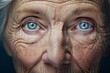 The performance of body aging shall be marked with wrinkles, spots. Blue eyes of senior old lady