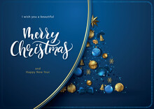 Blue Christmas Card With Christmas Decorations Arranged In The Shape Of A Christmas Tree And A Decorative Flap With Gold Lines And Text
