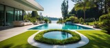 Fototapeta Miasto - Expansive indoor villa pool and artificial green turf Copy space image Place for adding text or design