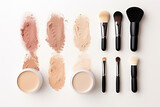 Fototapeta  - Liquid foundations, makeup brush, swatches and face powder on white background, flat lay, aesthetic look