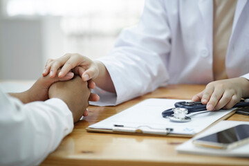 Kind doctor offering a loving gesture to a sick person during a health crisis.