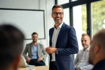 Conference training planning or learning coaching. Business people discussing a new strategy. Male business coach speaker in suit give presentation.