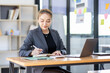 © David - Business asian woman working at office with documents on his desk, doing planning analyzing the financial report, business plan investment, finance analysis concept