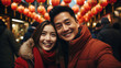 Portrait of Chinese couple with Chinese traditional clothing, on Chinese new year street