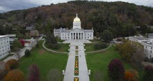 Aerial Fall Forward Shot Of Vermont State House And Pathway Near Hillside