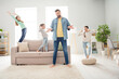 © deagreez - Portrait of nice funny cheerful family friends friendship dancing having fun alone daddy at home house living-room indoors