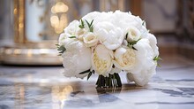 A Lavish Wedding Bouquet Of White Peonies And Roses On A Polished Marble Surface. Wedding Card, Bridal Invitation, Jewellery, Gem, Glamour. 