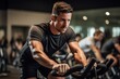 © Markus Schröder - focused boy in his 30s doing spinning in a cycling studio
