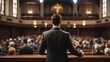 A man in a suit is preaching on top of a pulpit 
