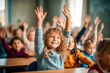 Children raising their hands to answer in the classroom. Back To School concept