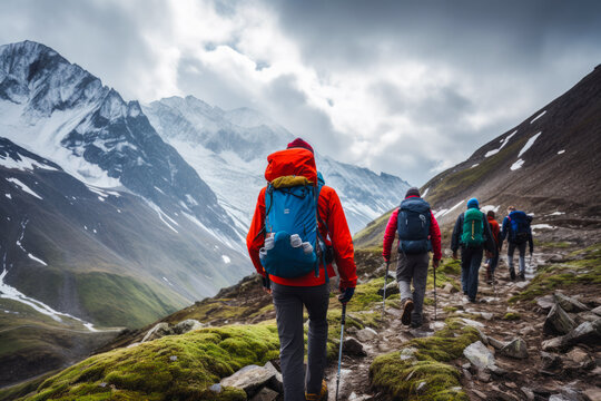 mountain guide leading a group of hikers