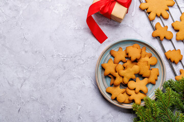 Wall Mural - Gingerbread cookies and fir tree branch