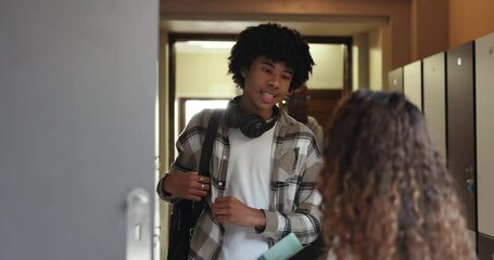 Canvas Print - University, lockers and friends in college talking for class, lesson and learning at academy. Education, happy students and man and woman with textbooks for studying, scholarship or school in hallway