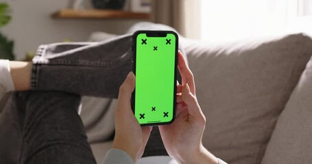 Unknown woman holds smartphone chroma key tracking points mockup. Advertisement app.Tap at bottom of screen buy online, submit an application, interact with app. Order, call, open, pay, launch program