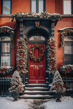 Red Door With Christmas Wreath On The Facade Of A House In New York.