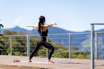 Sticker - Sport woman do yoga on mountain