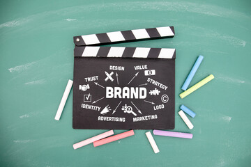 Wall Mural - brand. movie clapper and colored pieces of chalk