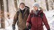 © Wirestock - two people in winter clothing walking through the snow near trees